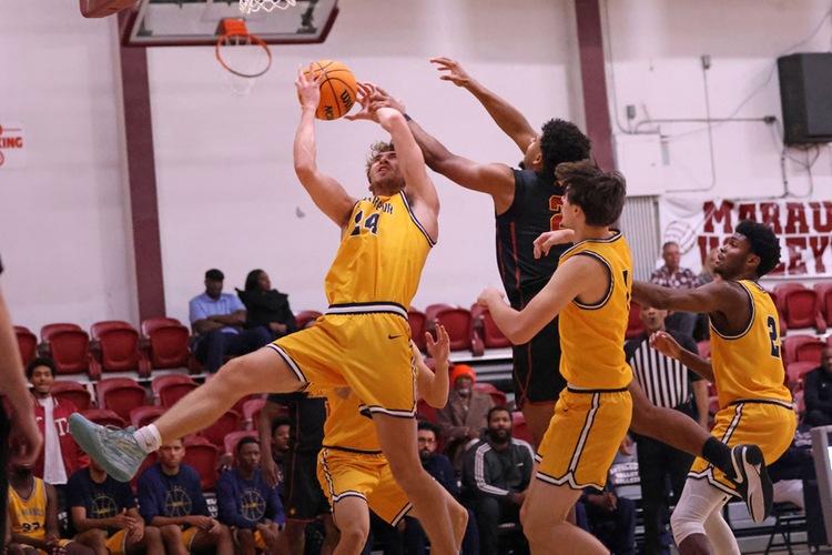 Davide Saccavino grabs a rebound at the Antelope Valley Tournament (photo courtesy of Richard Quinton).